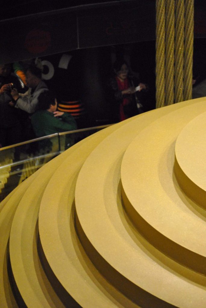 a close view of Taipei 101 gold painted wind damper